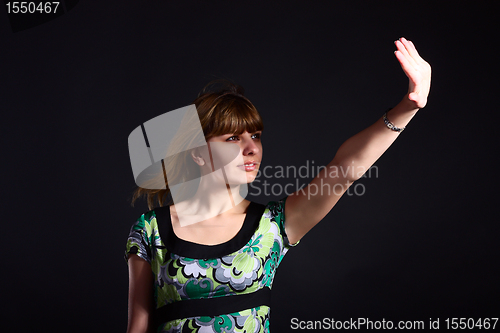 Image of Girl hides from shiny light