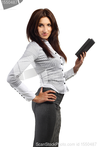 Image of Young woman stands with electronic book