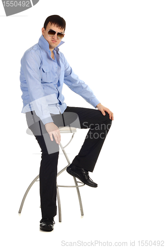 Image of Guy sitting on the chair