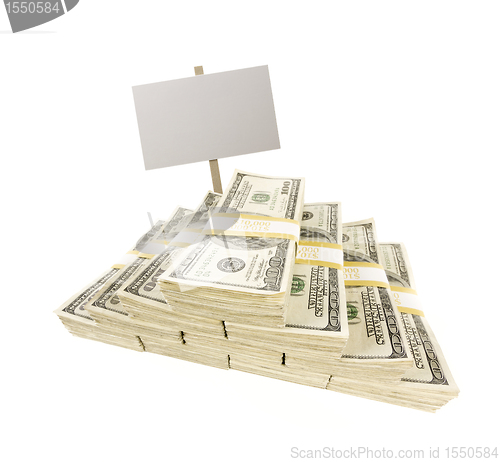 Image of Stacks of One Hundred Dollar Bills on White with Blank Sign