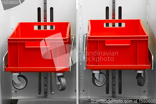 Image of Two red crates