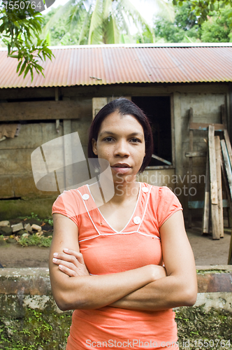 Image of Nicaragua Corn Island portrait lady house 