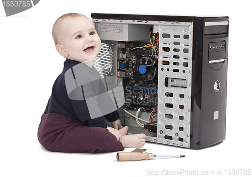 Image of young child wit screwdriver and ram