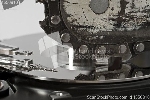 Image of Chain saw and hard drive