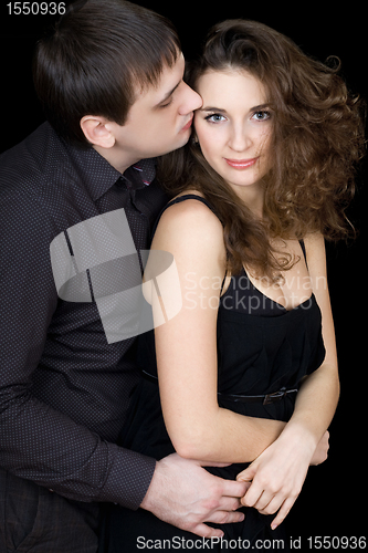Image of Playful young couple flirting