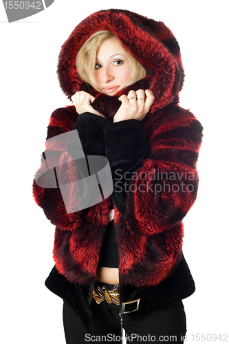 Image of Portrait of smiling blond woman in fur jacket