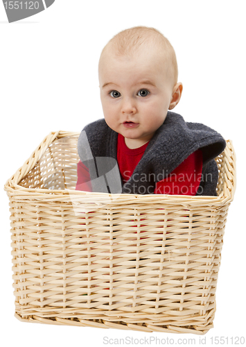 Image of toddler in wickerbasket