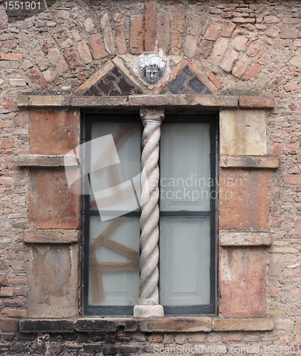 Image of Broken window of old Medieval house