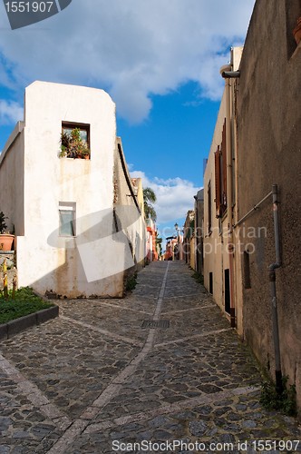 Image of Small street in Italian town converging in perspective