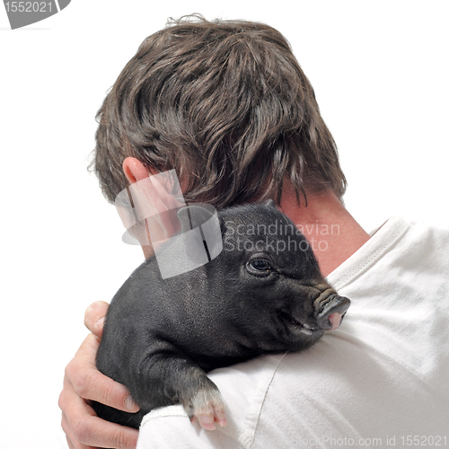 Image of liitle piggy and man