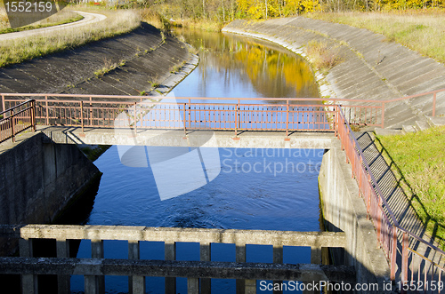 Image of River dam and reflections on water background 