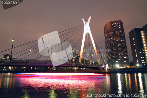 Image of suspension bridge and ship
