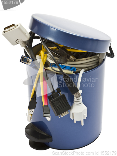 Image of trashcan with electronic waste