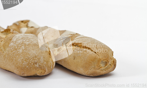 Image of two baguettes on light background