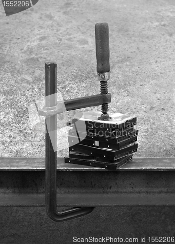 Image of compressed stack of hard disks-black and white shot