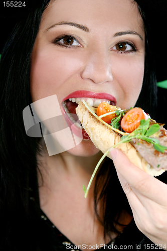 Image of Female eating healthy food