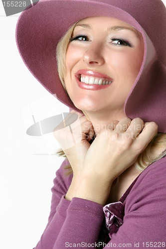 Image of Happy smiling woman in large brimmed sunhat