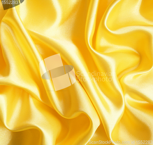 Image of Smooth elegant golden silk as background 
