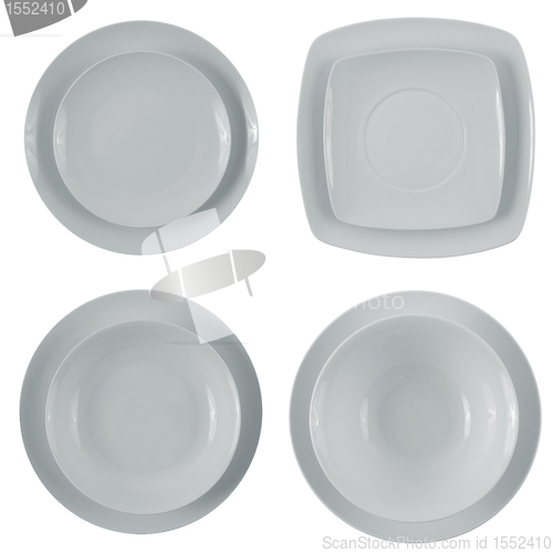 Image of Set of empty white plates