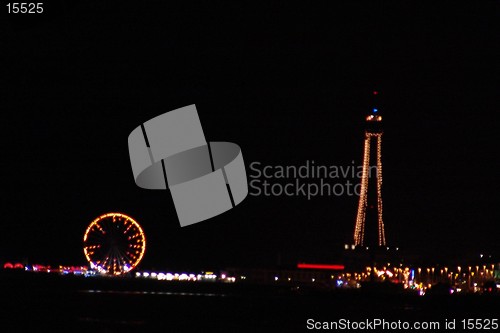 Image of blackpool tower and wheel at night