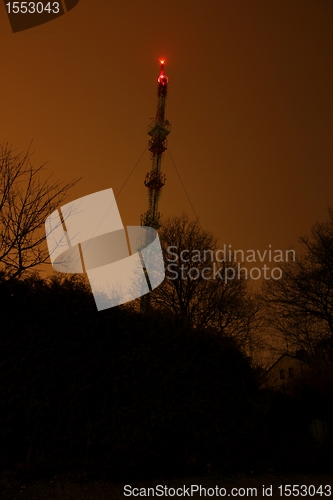 Image of radio tower at night