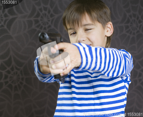 Image of Boy with a weapon