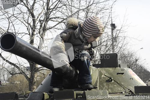 Image of Kid on a tank