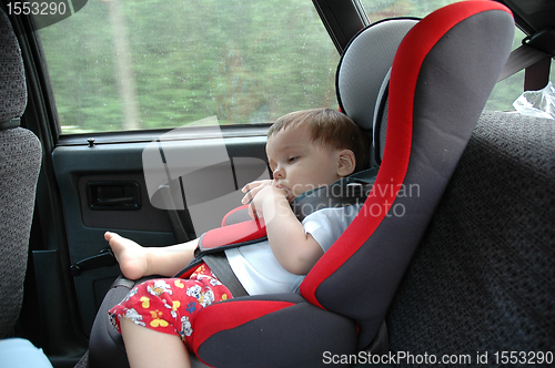 Image of sweet child in car