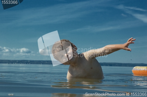 Image of Swimming kid. Happy childhood