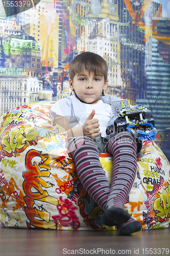 Image of Kid with toy