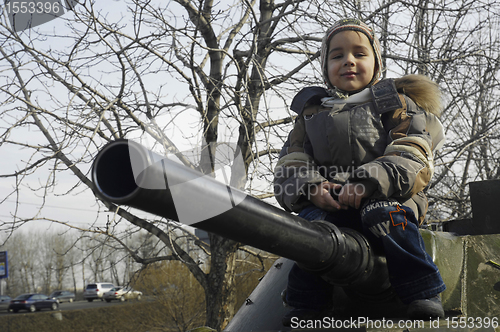 Image of Kid on a tank