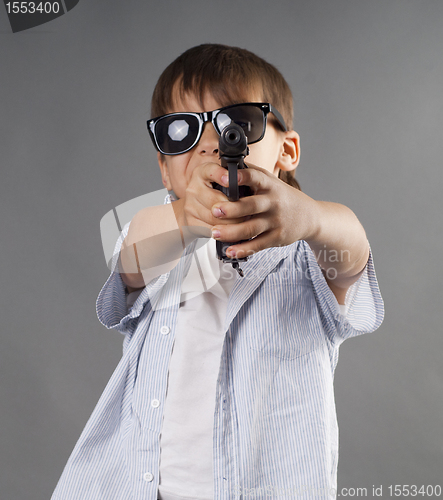 Image of Boy with a weapon