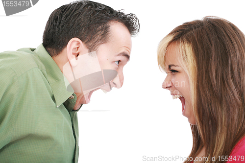 Image of Portrait of a man and woman yelling at each other against white background