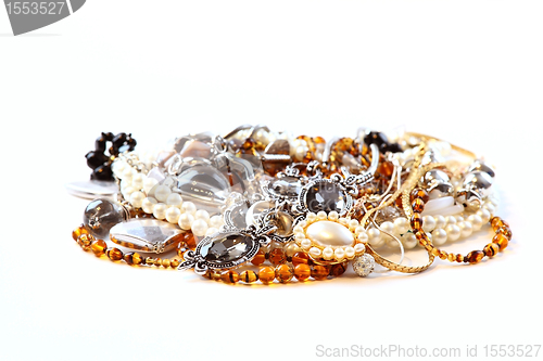 Image of Various jewellery and accessories on white background