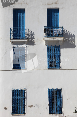 Image of Sidi Bou Said - typical building with white walls, blue doors and windows