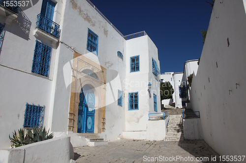 Image of Sidi Bou Said - typical building with white walls, blue doors and windows