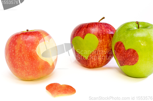 Image of three apples with hearts