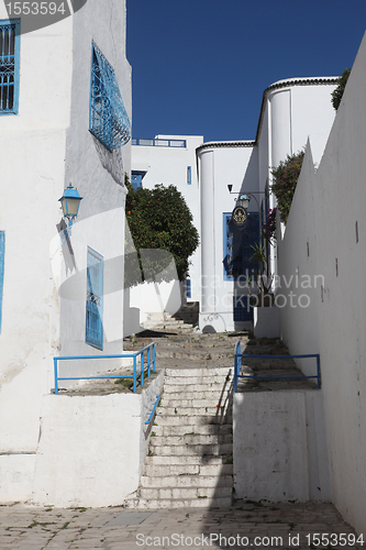 Image of Sidi Bou Said - typical building with white walls, blue doors and windows