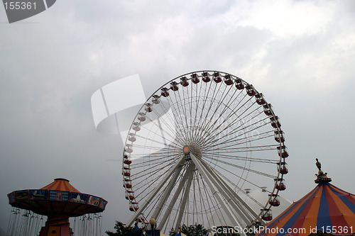 Image of Ferris Wheel with Clouds