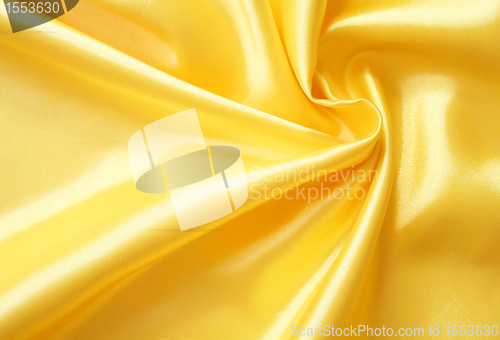 Image of Smooth elegant golden silk as background 