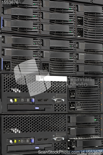 Image of servers stack with hard drives in a datacenter