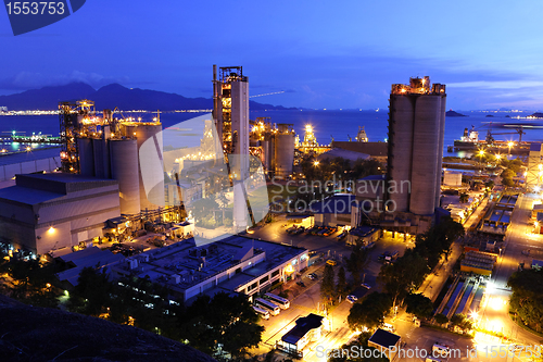 Image of cement factory at night