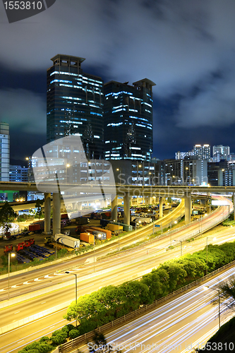 Image of traffic on highway in urban at night