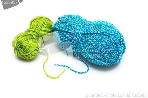 Image of Clews of blue and green wool threads for knitting isolated
