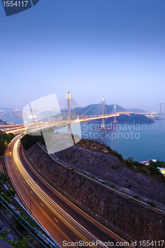 Image of highway and Ting Kau bridge at night