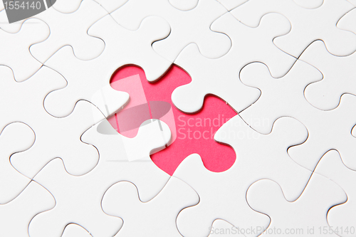 Image of puzzle with missing piece