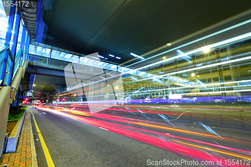 Image of modern city traffic at night