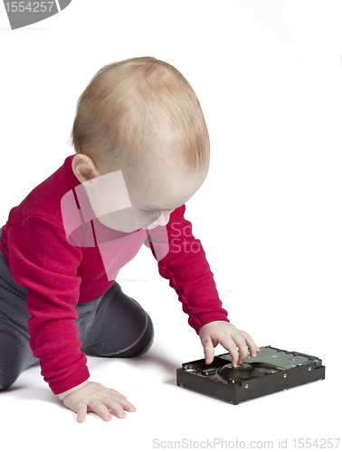 Image of young child in white background with hard drive