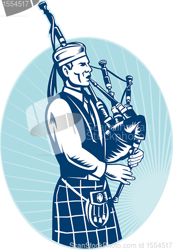 Image of Bagpiper Playing Scottish Great Highland Bagpipe