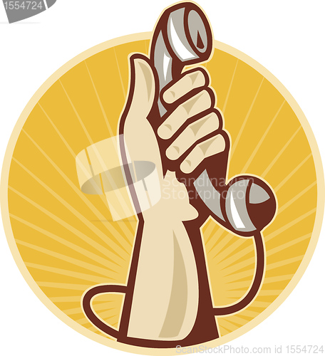 Image of hand holding retro telephone